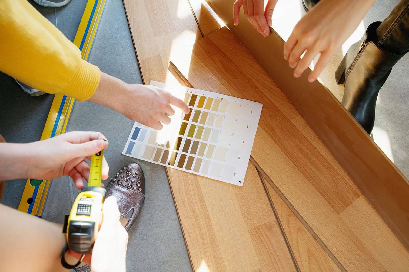 Interior contractor measuring the deck
